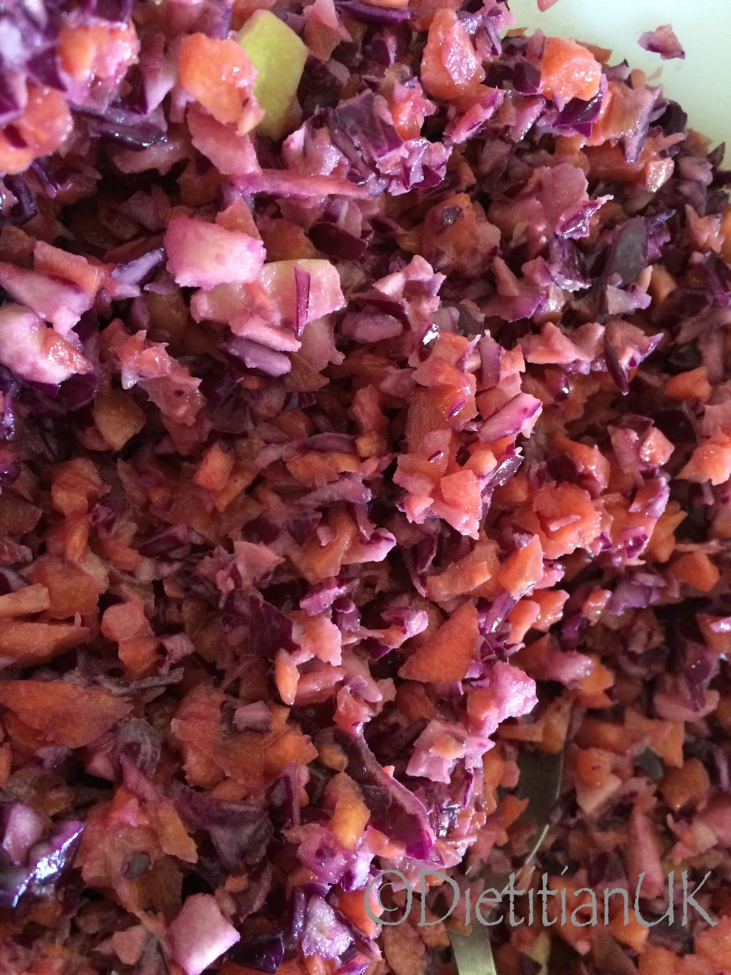 Red cabbage, apple and carrot healthy slaw.